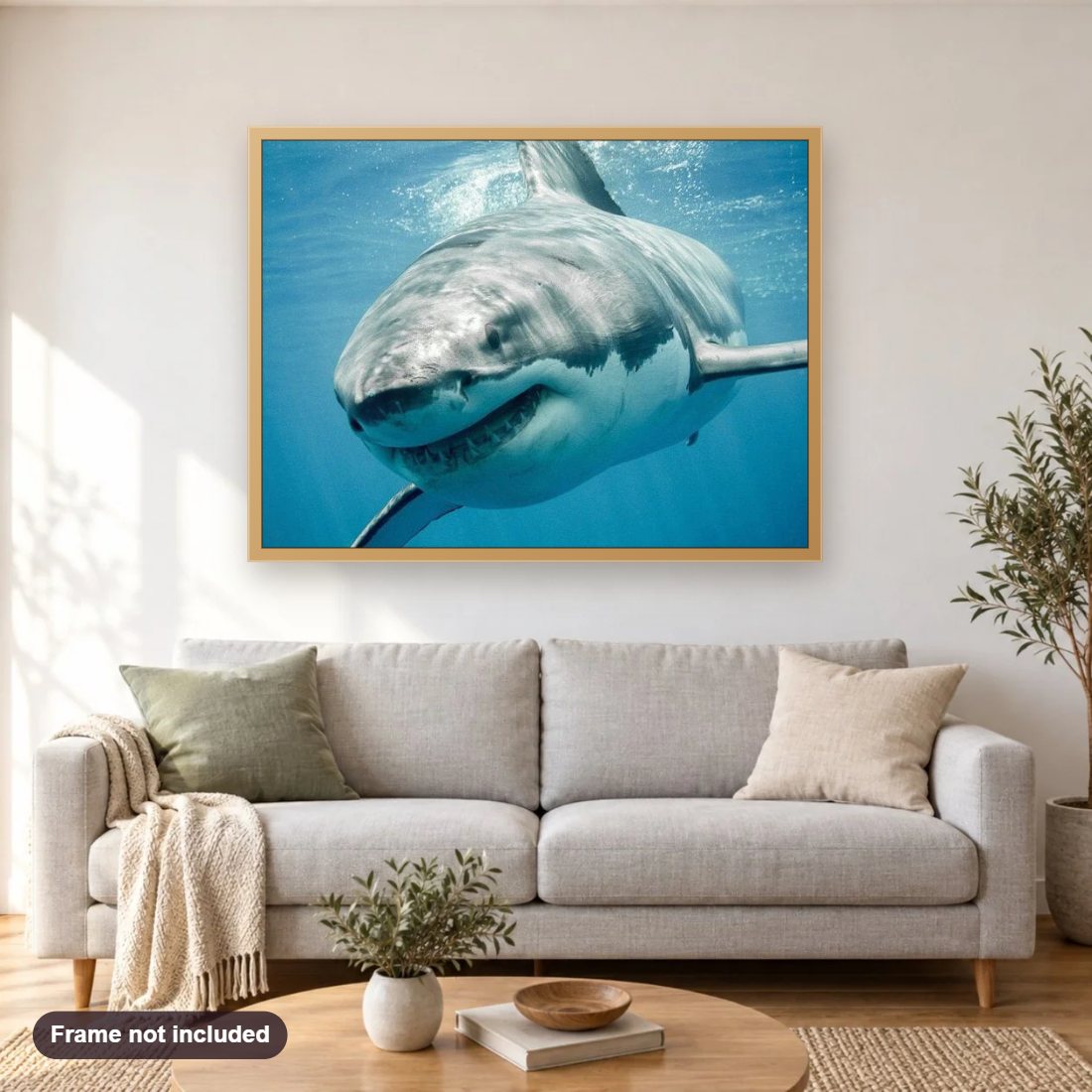 Shark in Blue Water diamond painting shown framed on a living room wall above a sofa