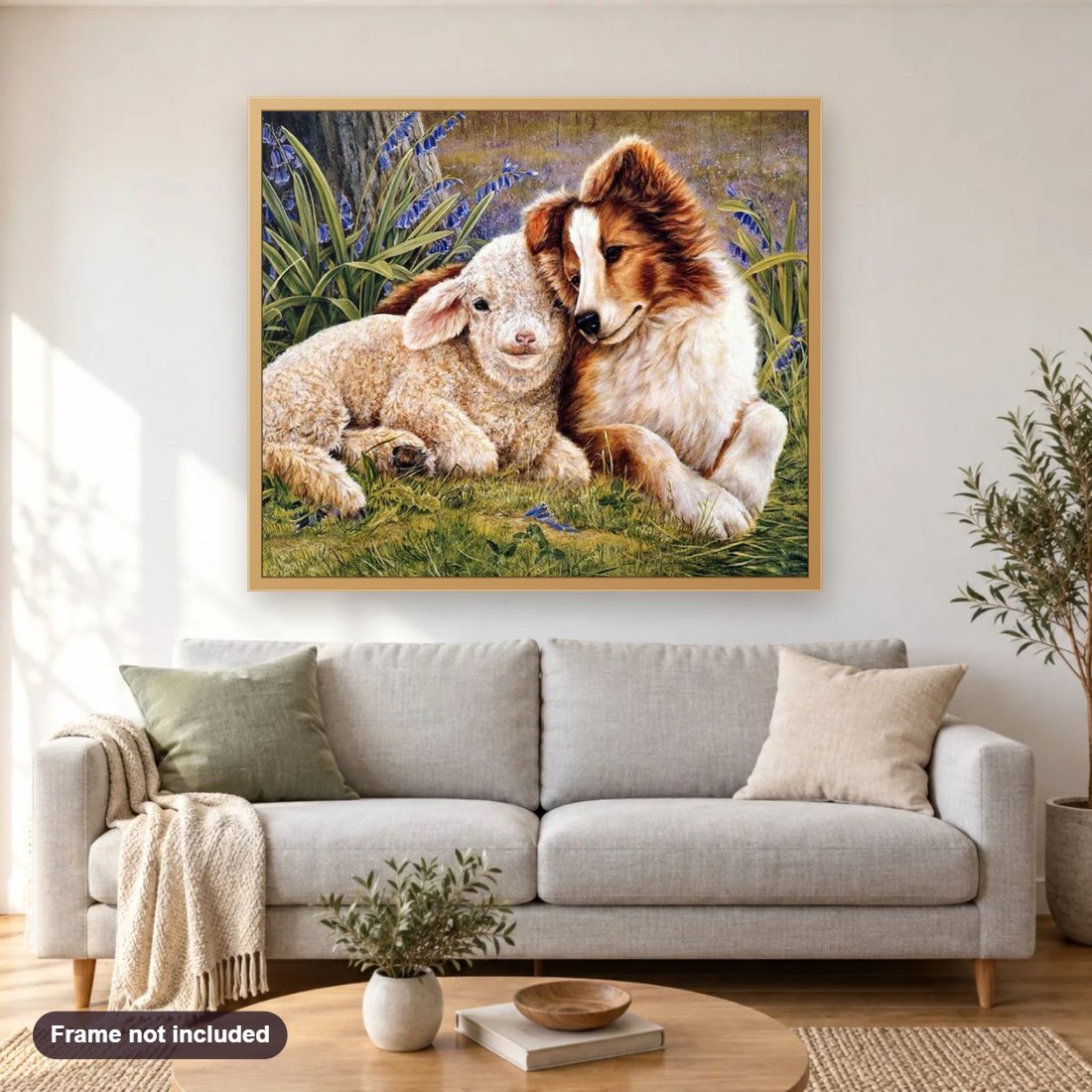 Sheep & Dog Friendship diamond painting shown framed on a living room wall above a sofa