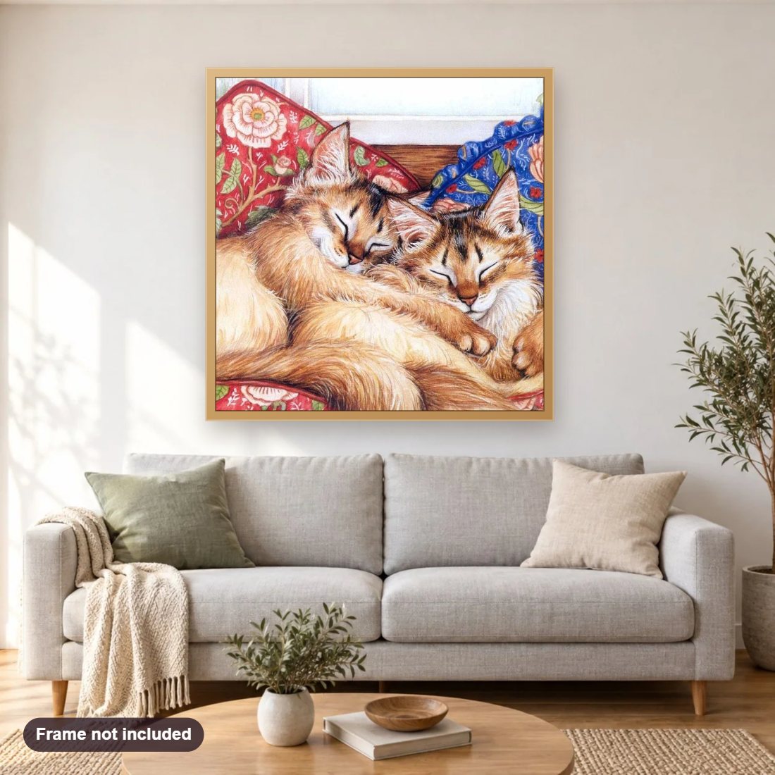 Sleeping Cats diamond painting shown framed on a living room wall above a sofa