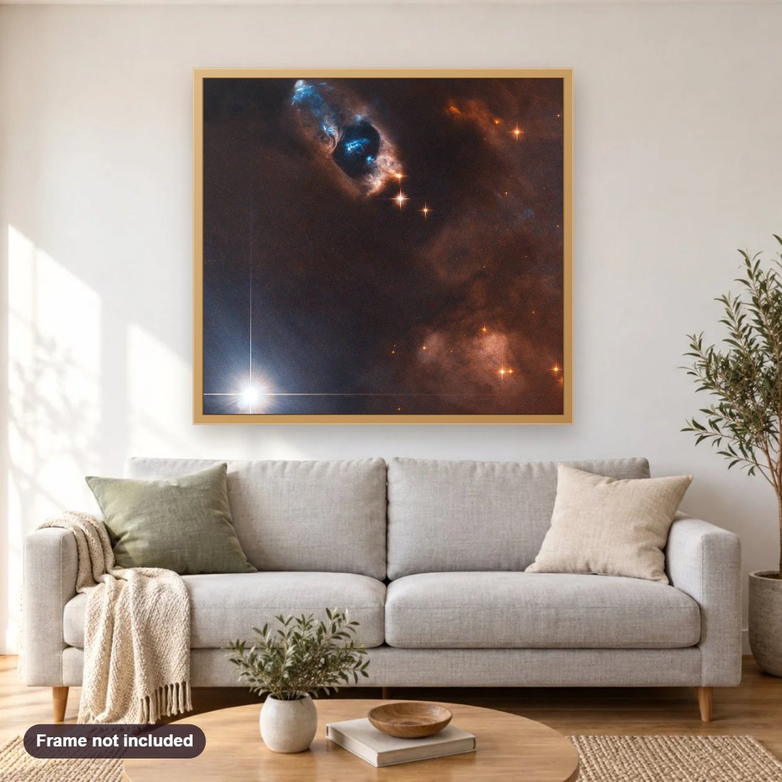Smoking Gun of a Newborn Star diamond painting shown framed on a living room wall above a sofa