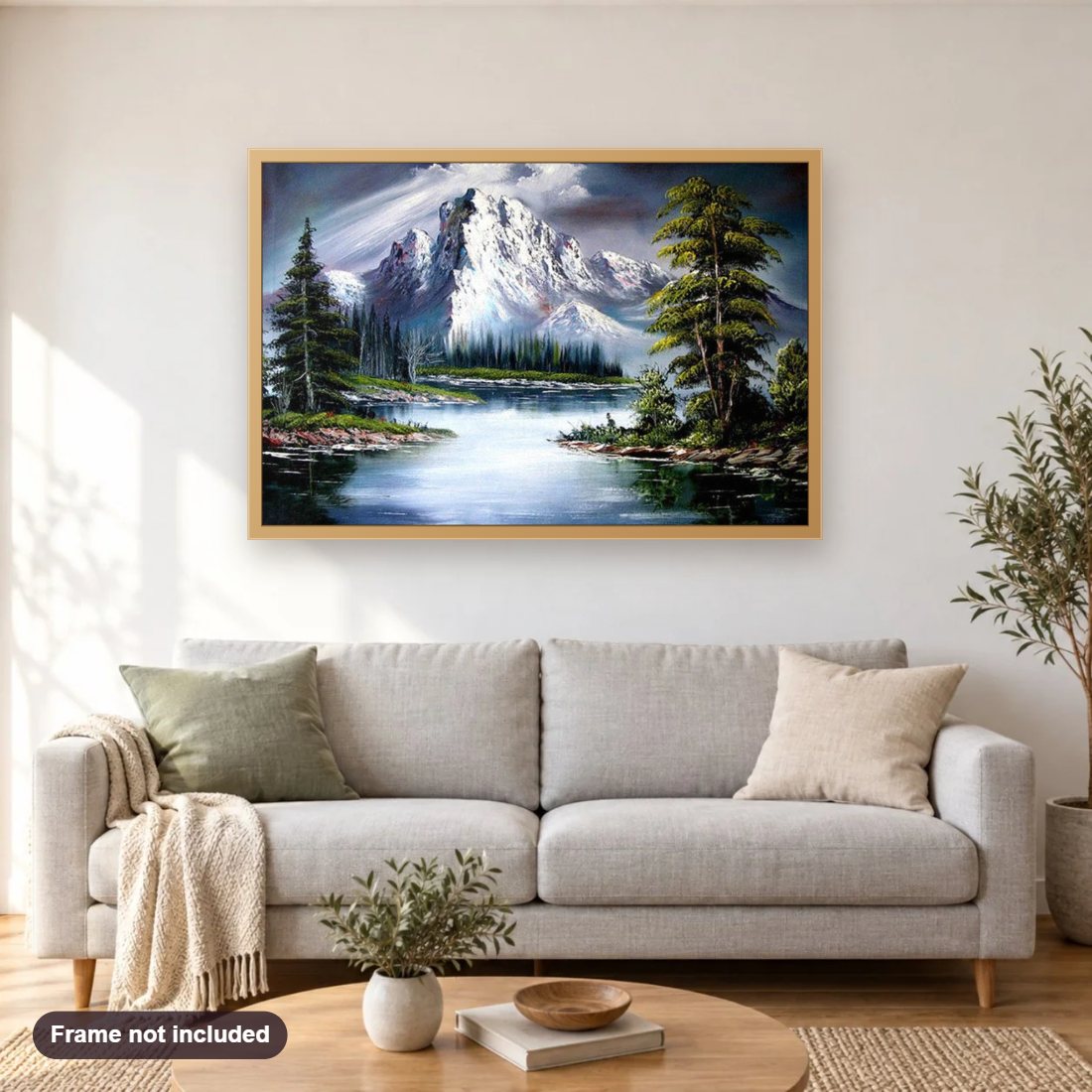 Snowy Mountain & Lake diamond painting shown framed on a living room wall above a sofa