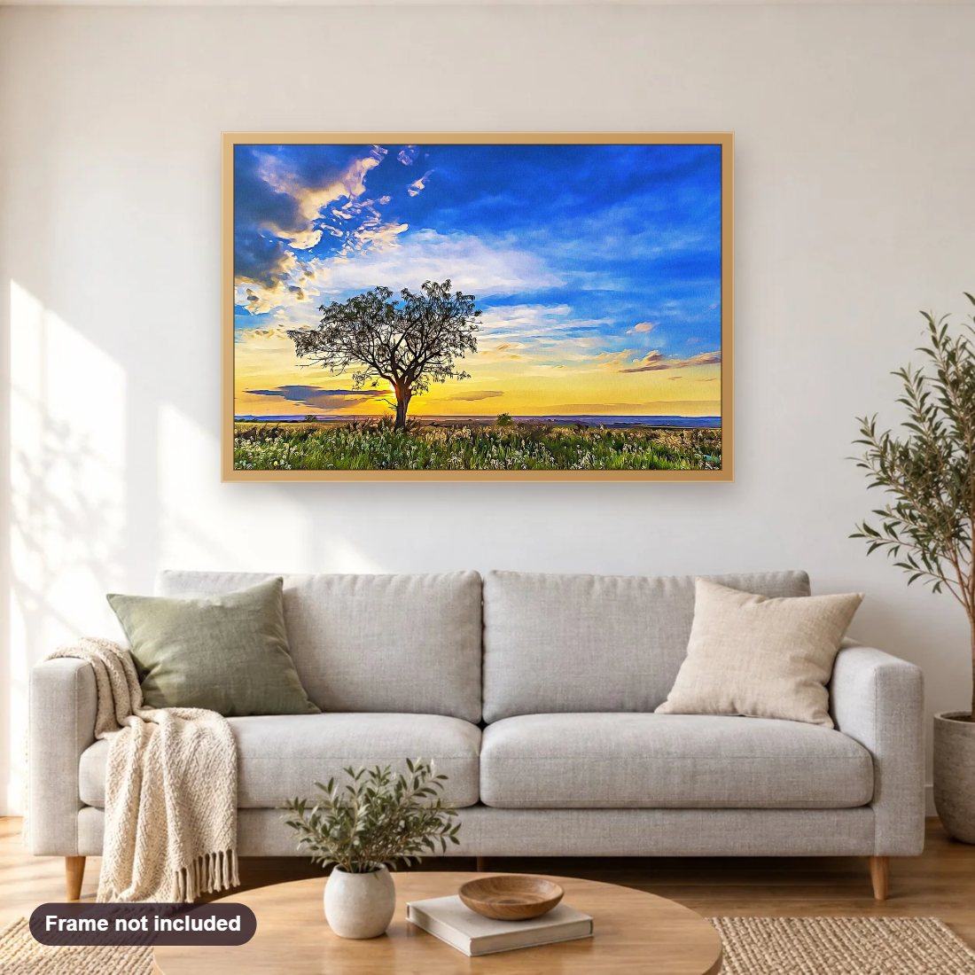 Solitary Tree At Sundown diamond painting shown framed on a living room wall above a sofa