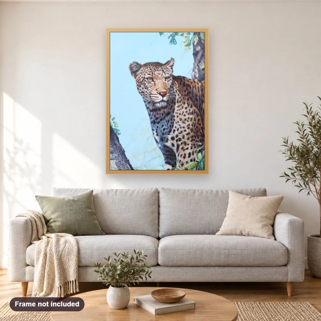 South African Leopard diamond painting shown framed on a living room wall above a sofa