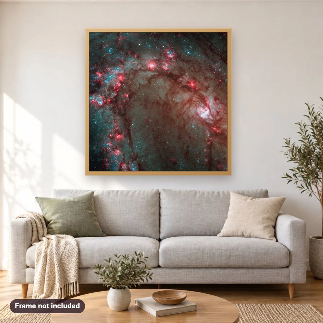 Southern Pinwheel Galaxy diamond painting shown framed on a living room wall above a sofa