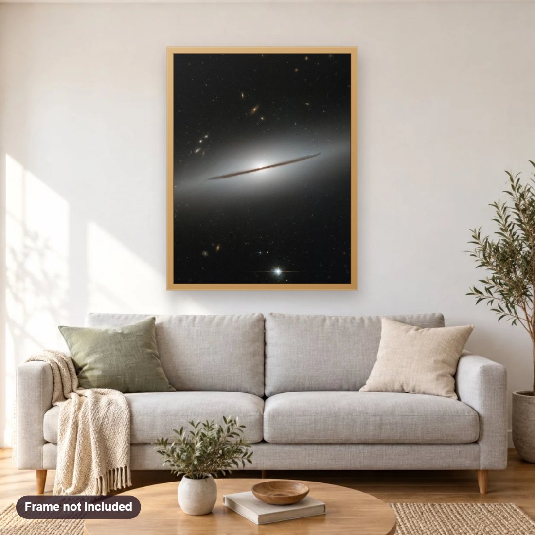 Spiral Galaxy in Disguise diamond painting shown framed on a living room wall above a sofa