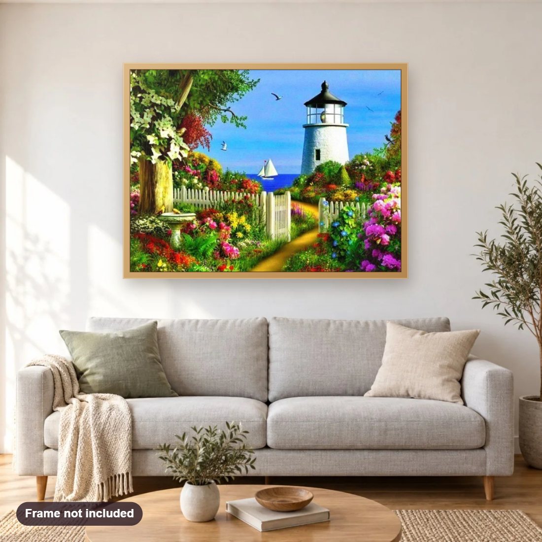 Spring Point Ledge Lighthouse diamond painting shown framed on a living room wall above a sofa