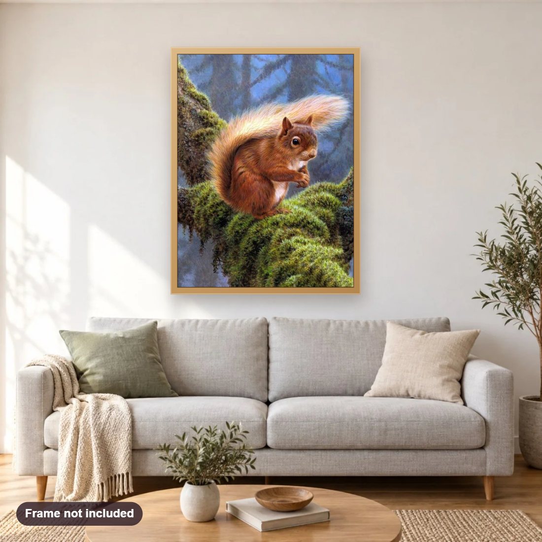 Squirrel in the Forest diamond painting shown framed on a living room wall above a sofa