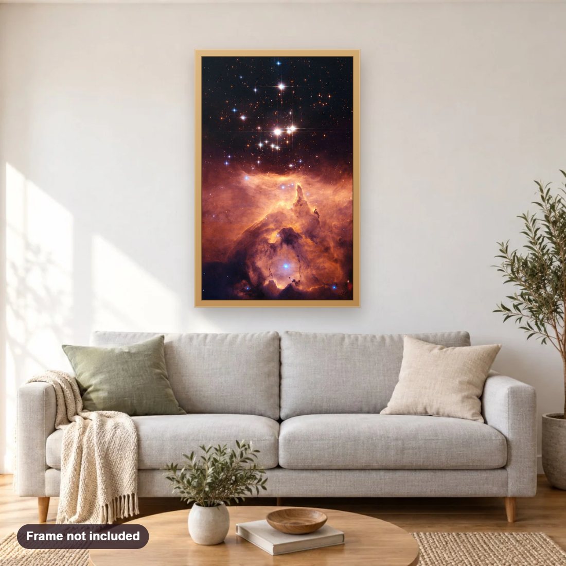 Star Cluster Pismis 24 1 diamond painting shown framed on a living room wall above a sofa