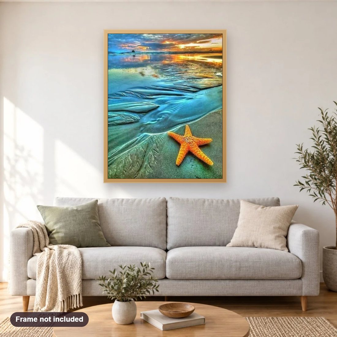 Star Fish diamond painting shown framed on a living room wall above a sofa