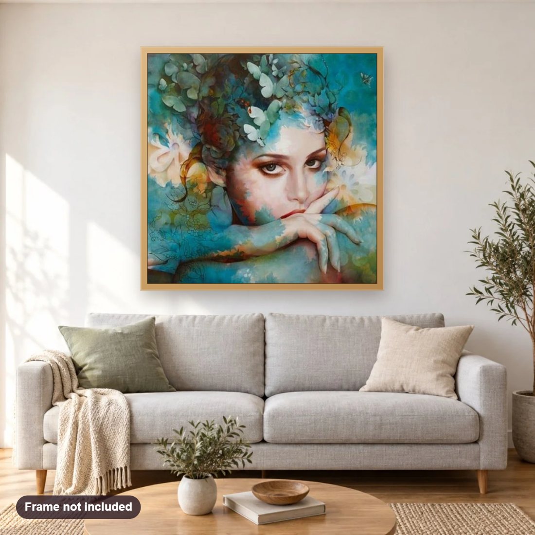 Stunning Beauty diamond painting shown framed on a living room wall above a sofa