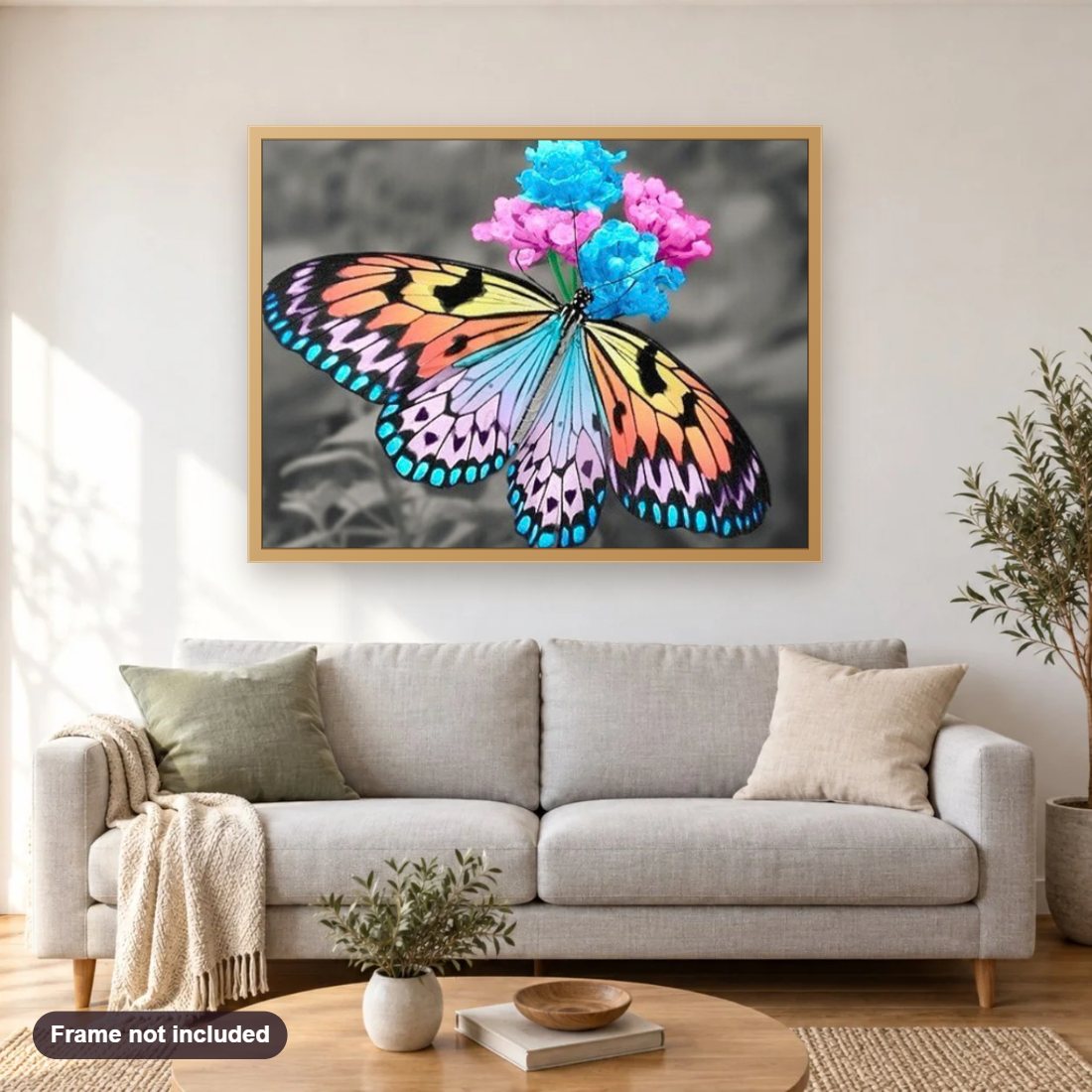 Stunning Butterfly & Flowers diamond painting shown framed on a living room wall above a sofa