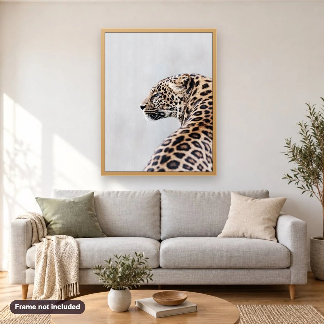 Stunning Jaguar diamond painting shown framed on a living room wall above a sofa