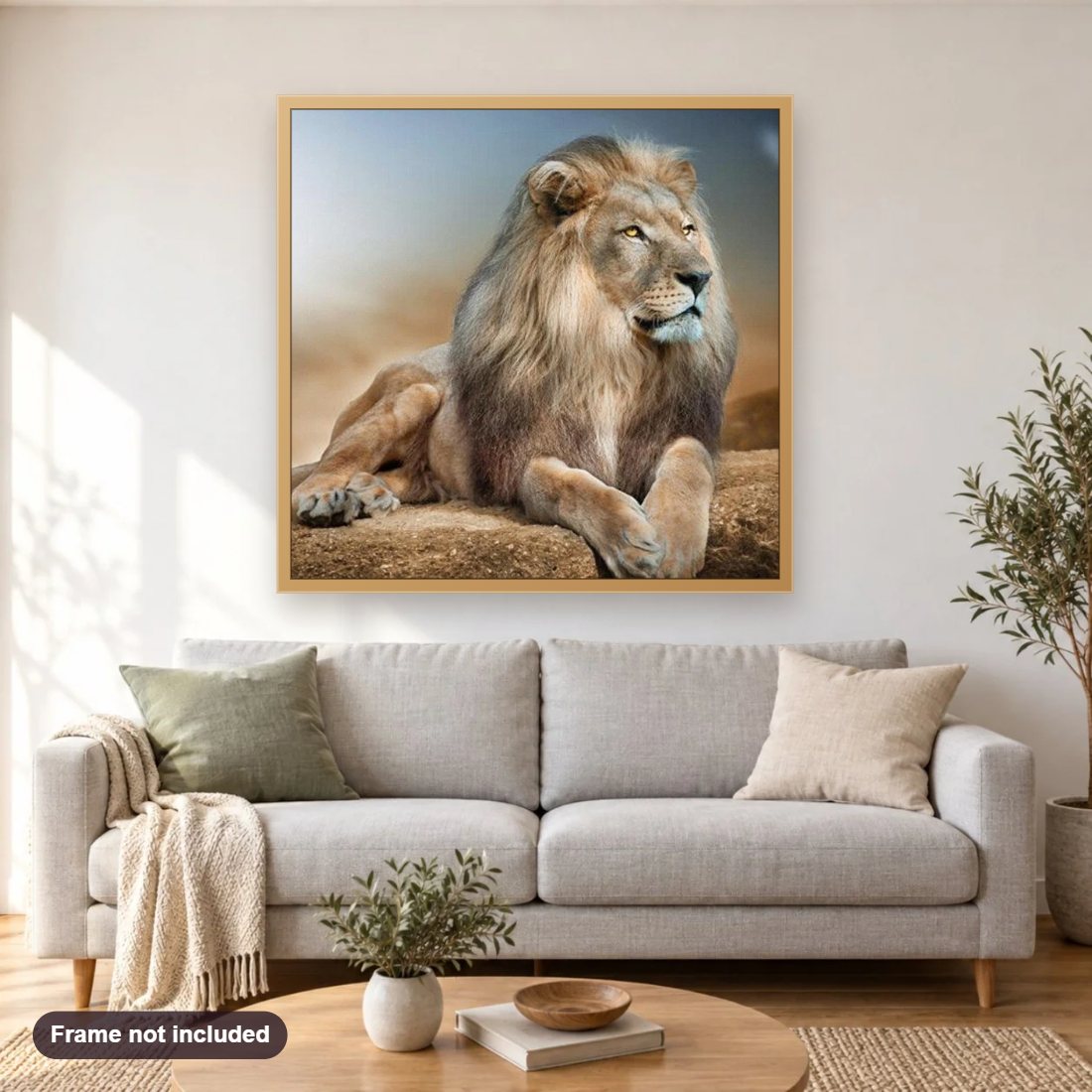 Stunning Lion diamond painting shown framed on a living room wall above a sofa