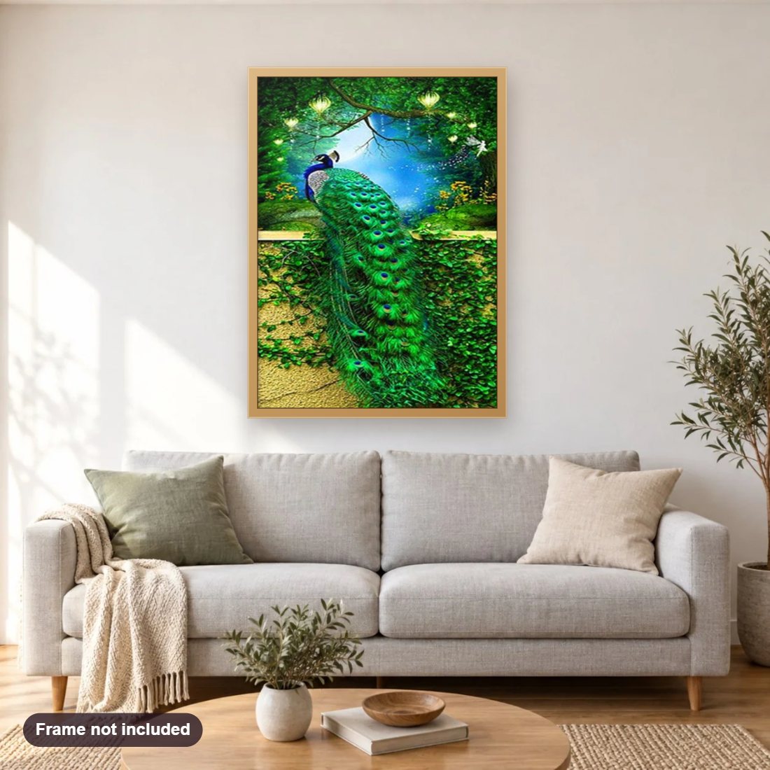 Stunning Peacock diamond painting shown framed on a living room wall above a sofa