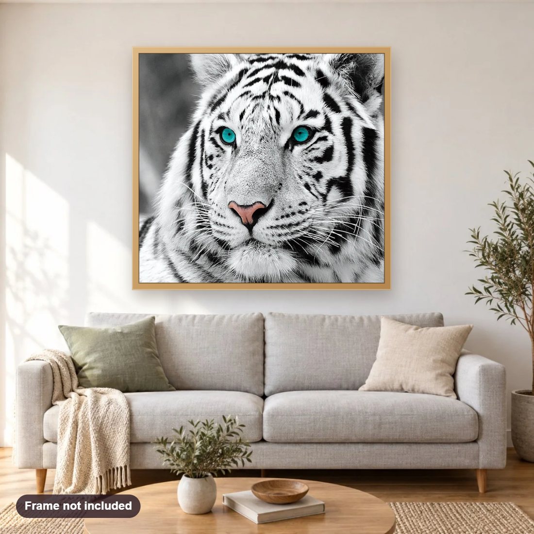 Stunning White Tiger diamond painting shown framed on a living room wall above a sofa