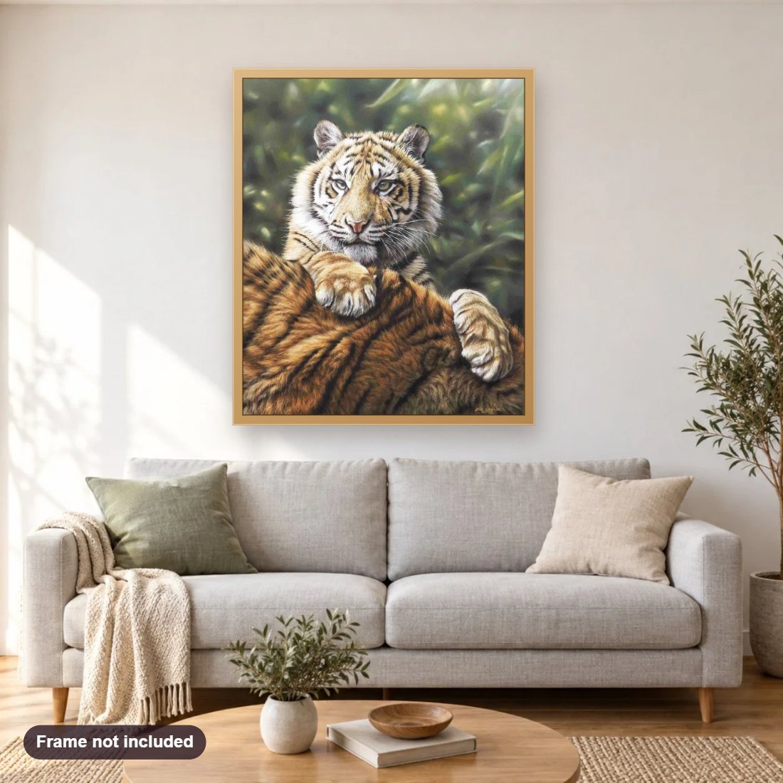 Sumatran Tiger Cub And Mother diamond painting shown framed on a living room wall above a sofa