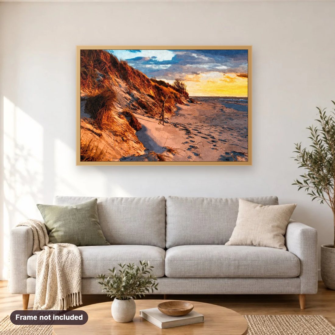 Sunset On The Dunes diamond painting shown framed on a living room wall above a sofa