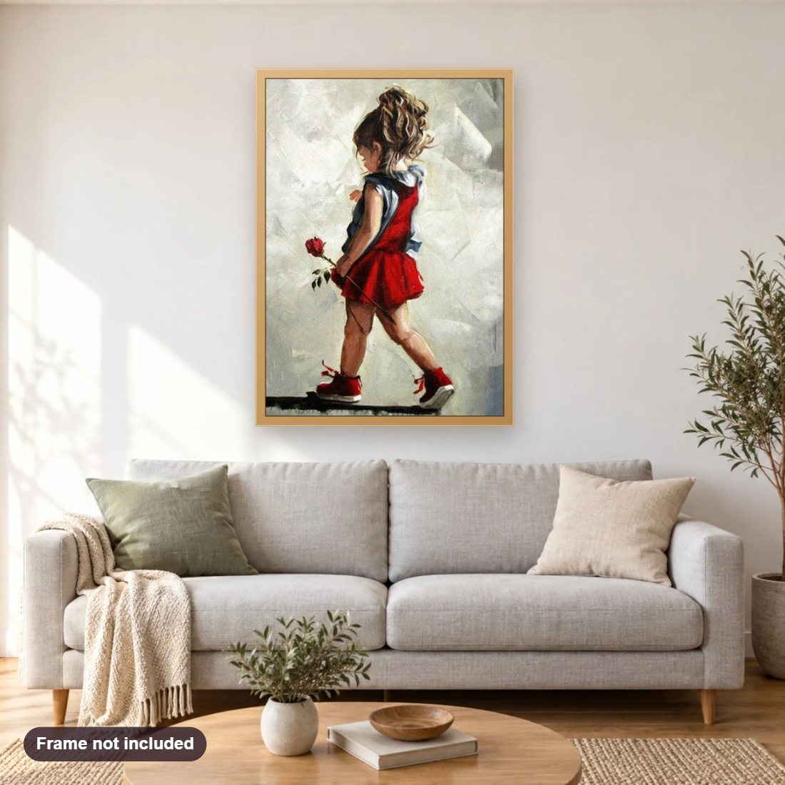 Sweet Child with Beautiful Rose diamond painting shown framed on a living room wall above a sofa