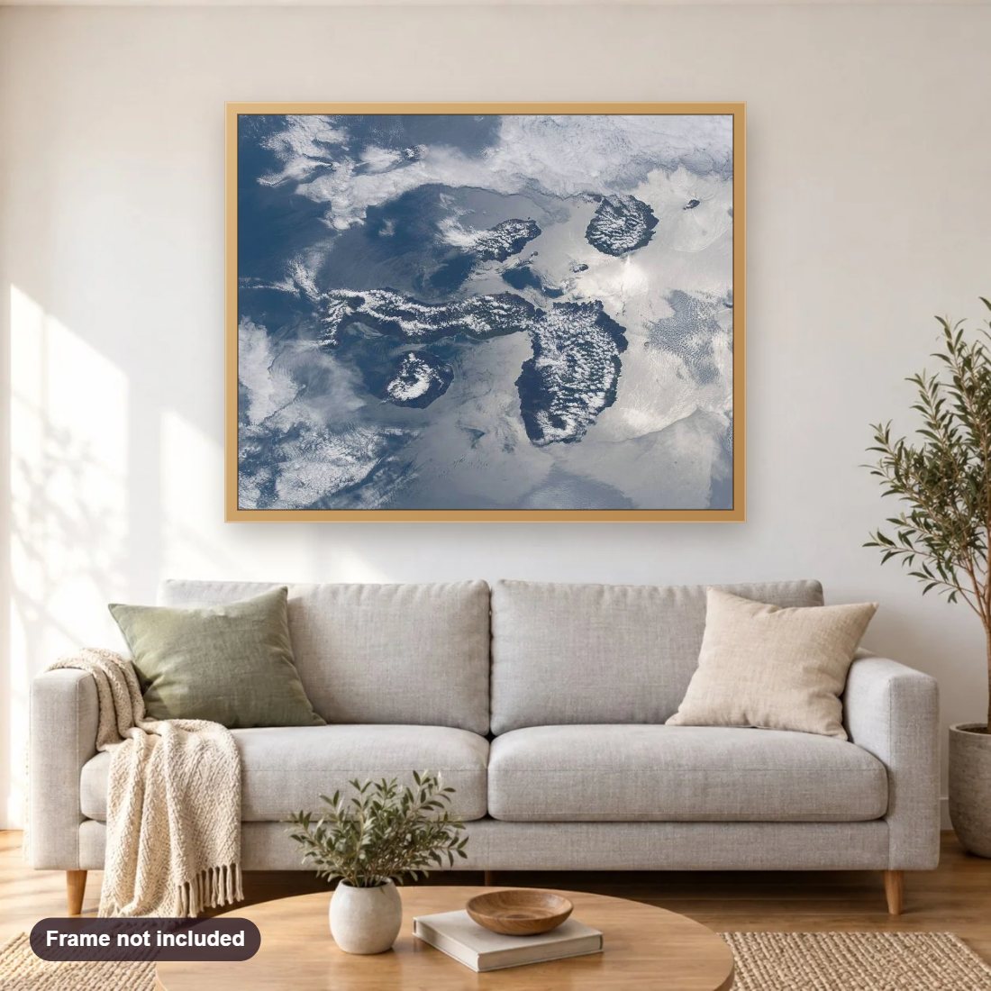 The Galapagos Islands diamond painting shown framed on a living room wall above a sofa