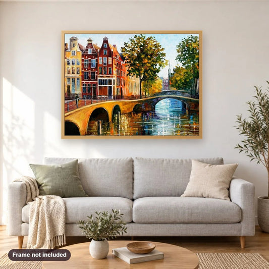 The Gateway to Amsterdam diamond painting shown framed on a living room wall above a sofa