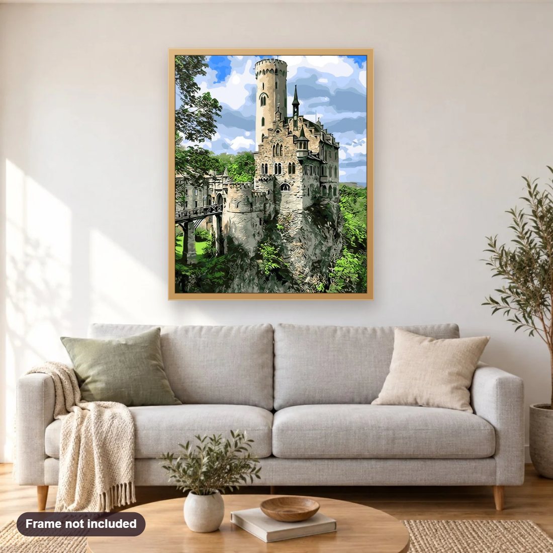 The Lichtenstein Castle diamond painting shown framed on a living room wall above a sofa