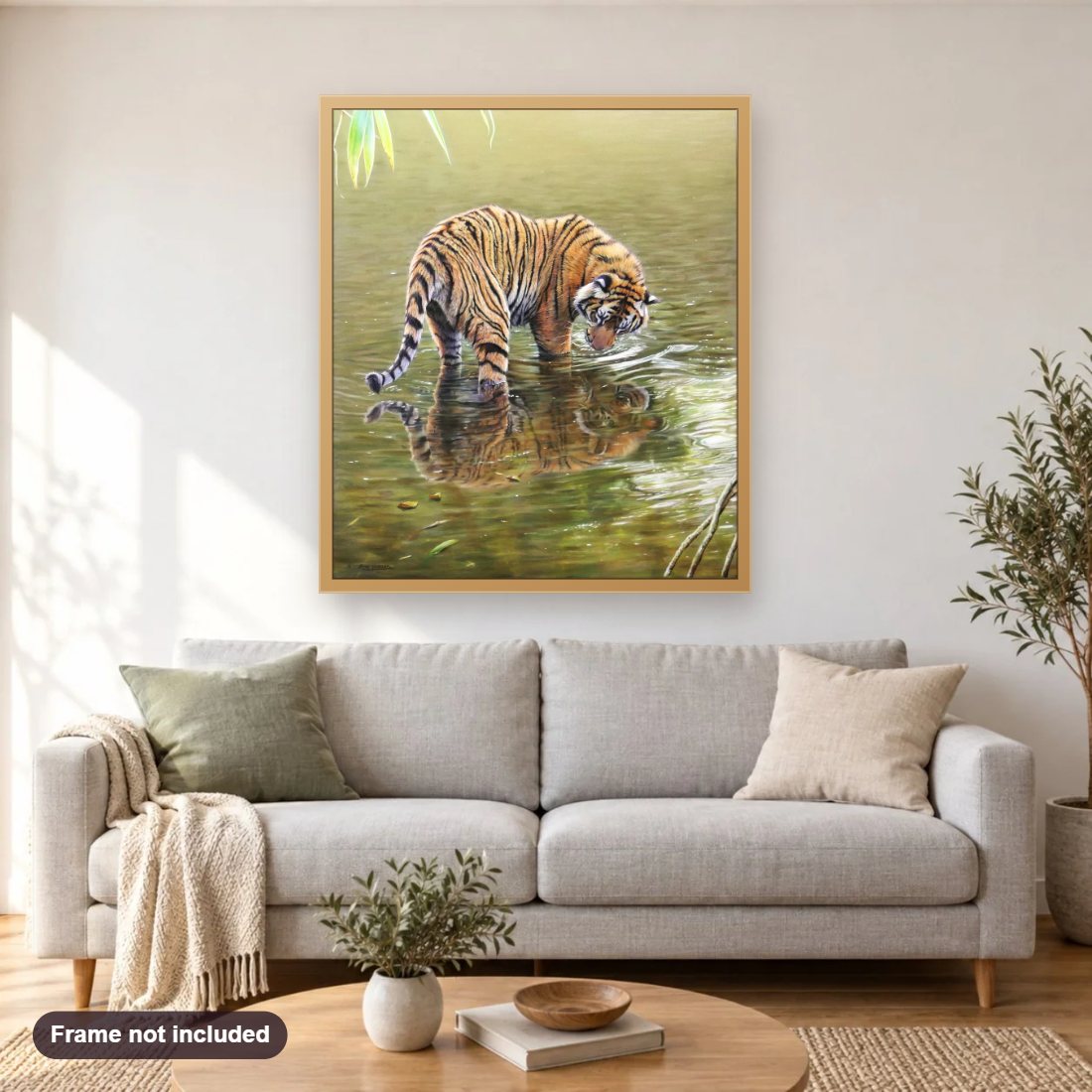 The One That Got Away diamond painting shown framed on a living room wall above a sofa