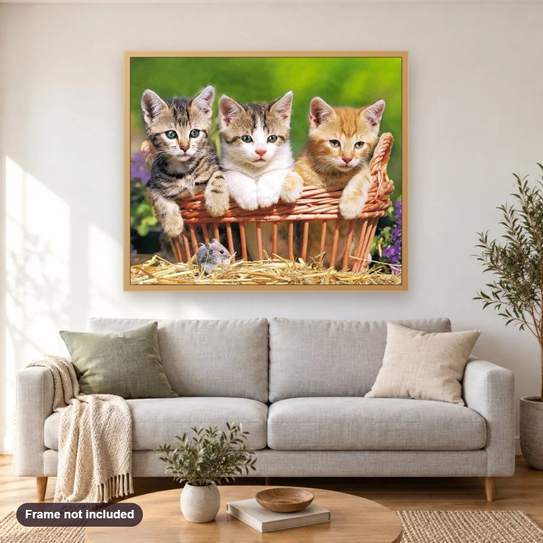 Three Lovely Kittens diamond painting shown framed on a living room wall above a sofa