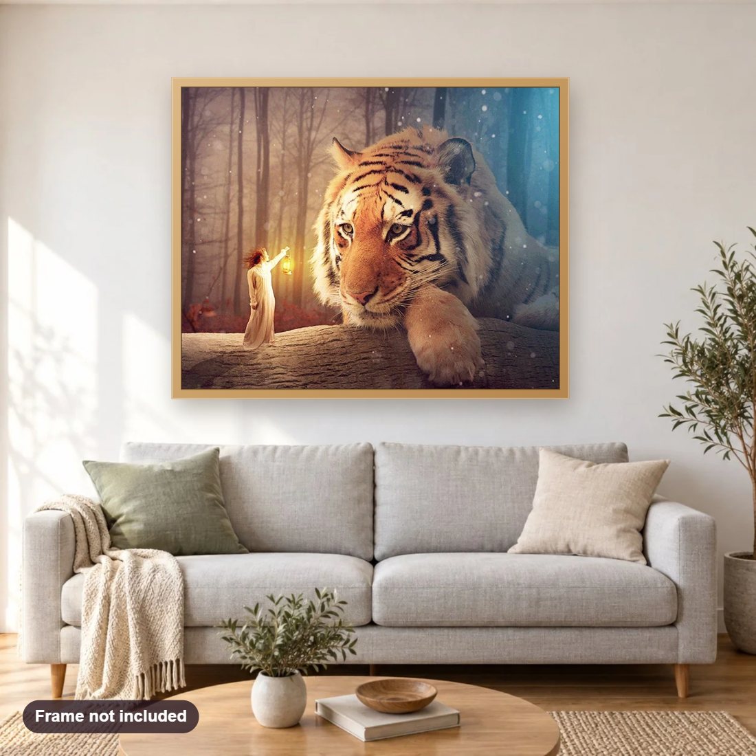 Tiger & Girl diamond painting shown framed on a living room wall above a sofa