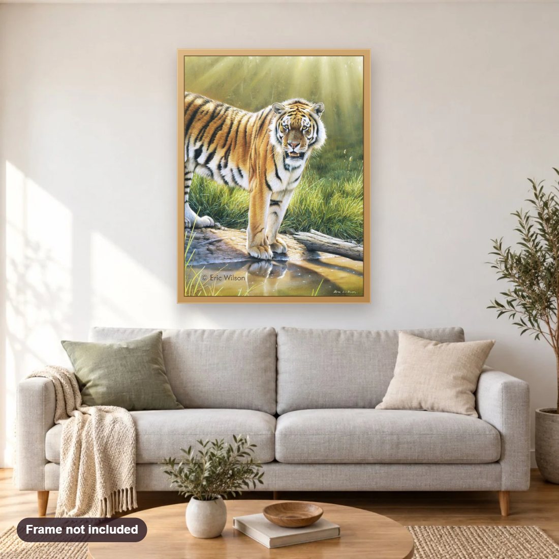Tiger in Chitwan diamond painting shown framed on a living room wall above a sofa
