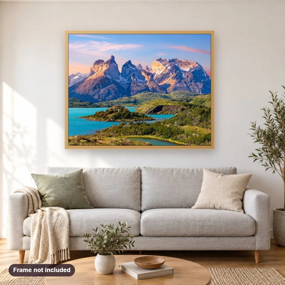 Torres del Paine National Park diamond painting shown framed on a living room wall above a sofa