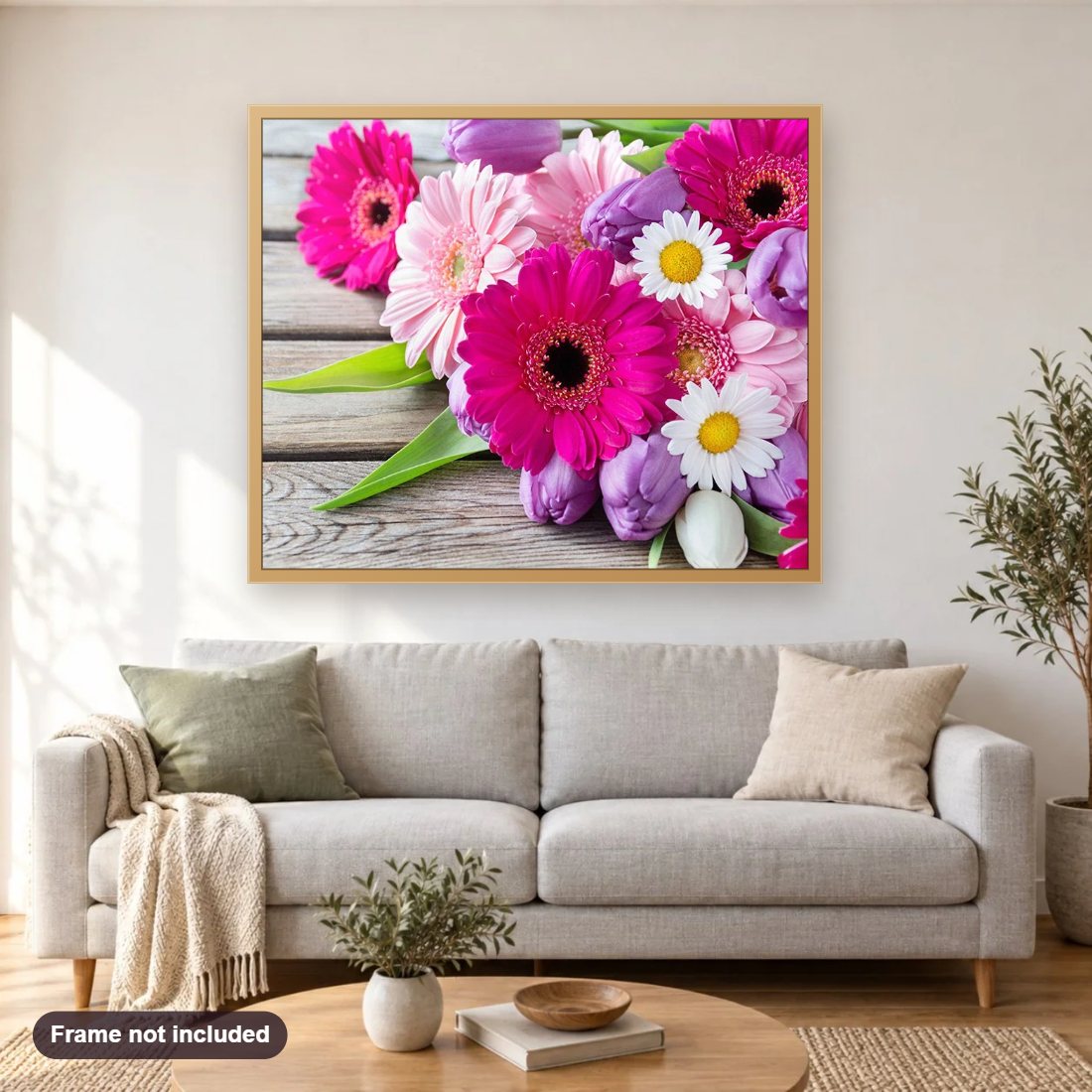 Transvaal Daisies diamond painting shown framed on a living room wall above a sofa