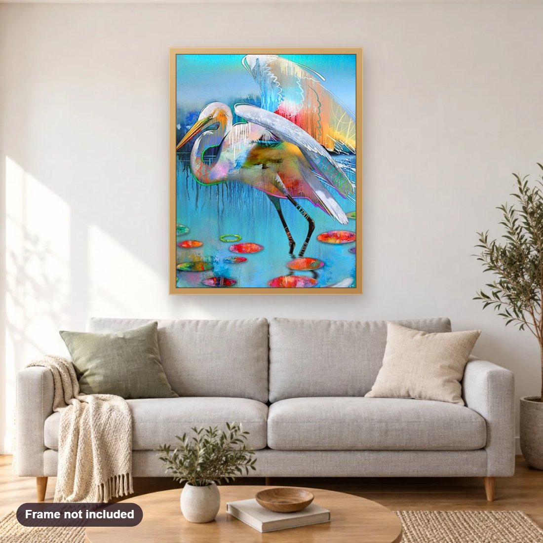Tropical Bird Art diamond painting shown framed on a living room wall above a sofa