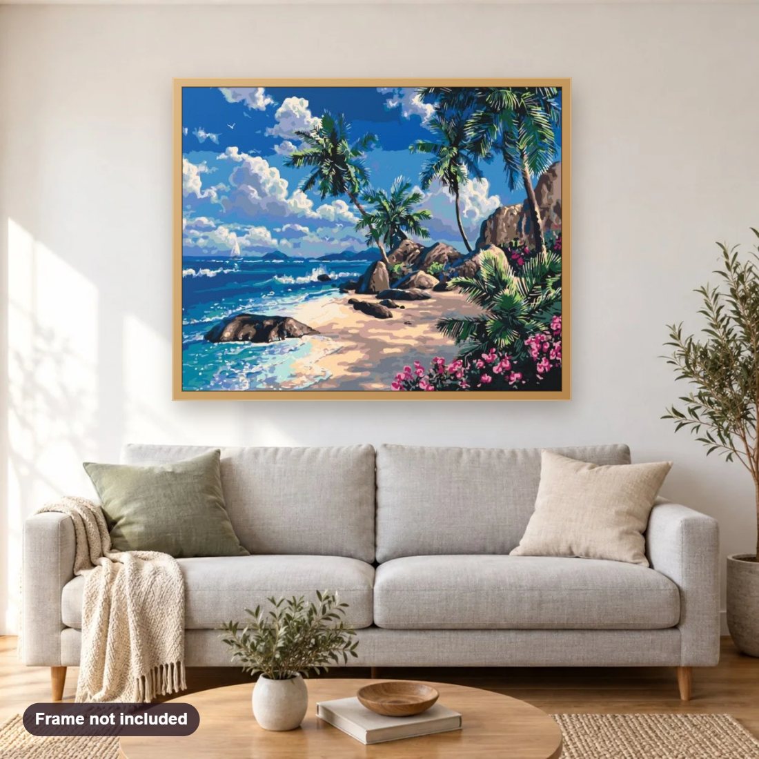 Tropical Paradise diamond painting shown framed on a living room wall above a sofa