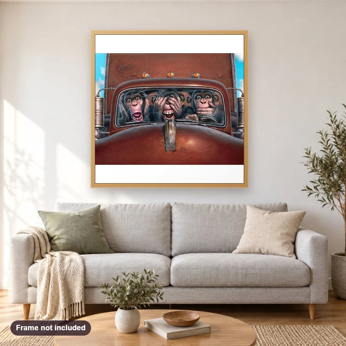 Truck Driver Monkeys diamond painting shown framed on a living room wall above a sofa