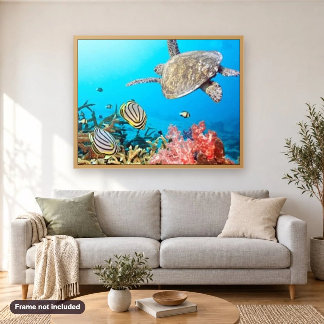 Turtle & Fish in the Sea diamond painting shown framed on a living room wall above a sofa