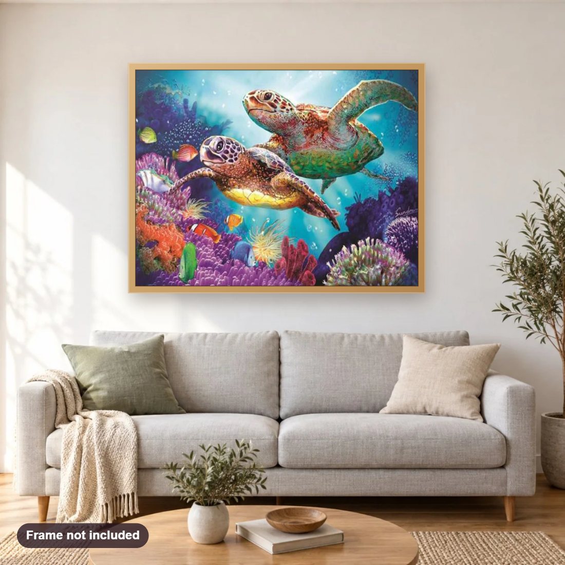 Turtles Pair diamond painting shown framed on a living room wall above a sofa