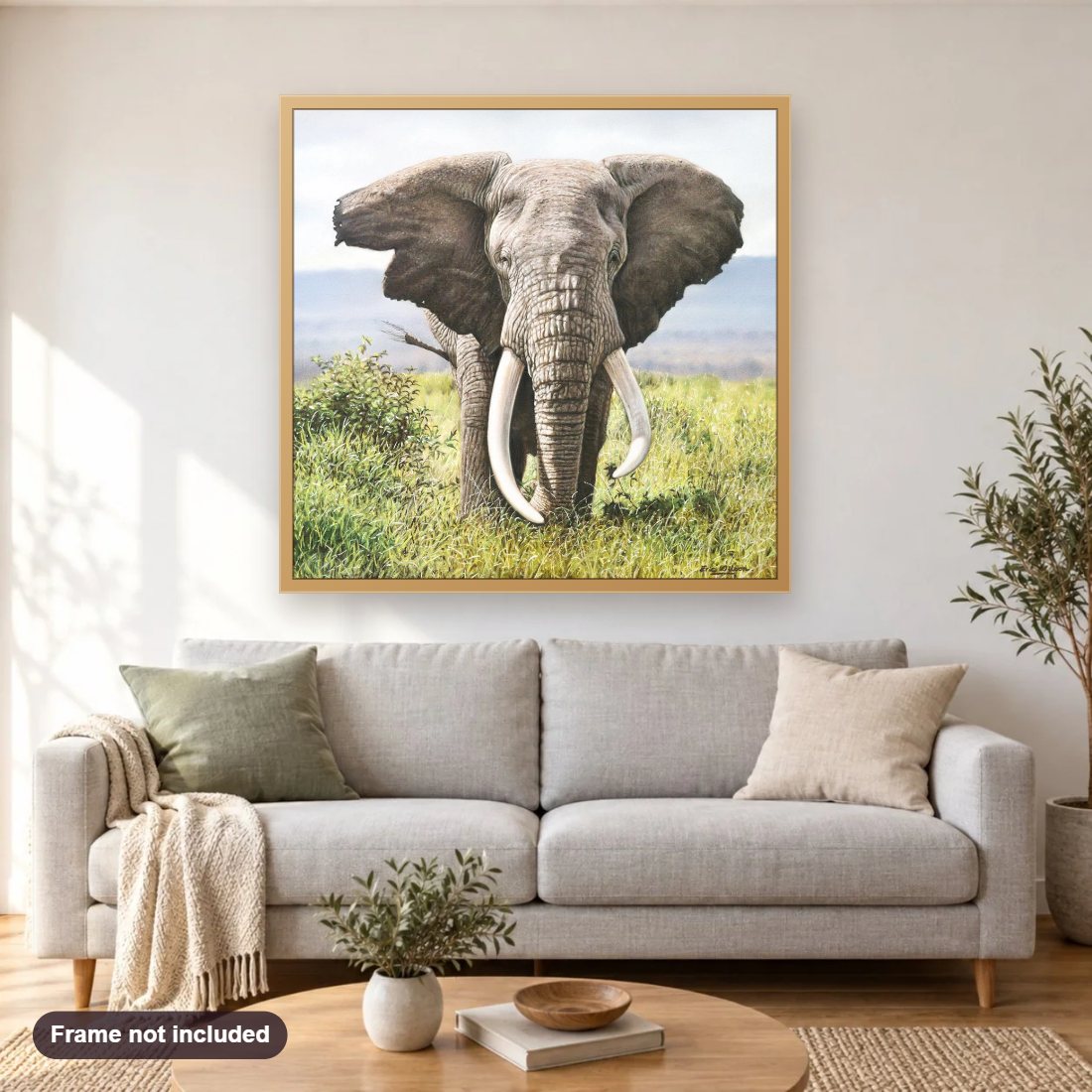 Tusker diamond painting shown framed on a living room wall above a sofa