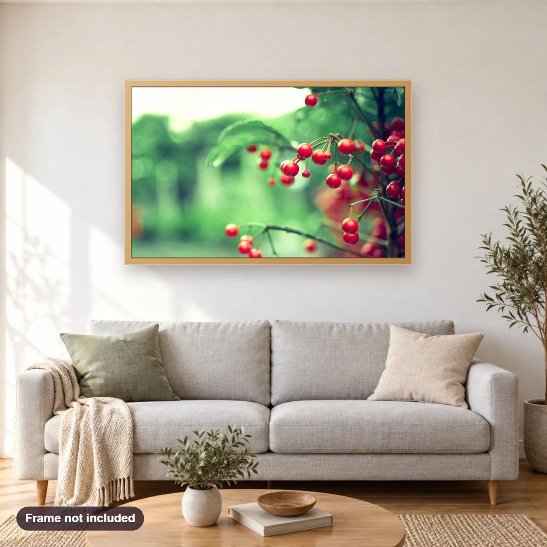 Twig Red Berries Leaves diamond painting shown framed on a living room wall above a sofa
