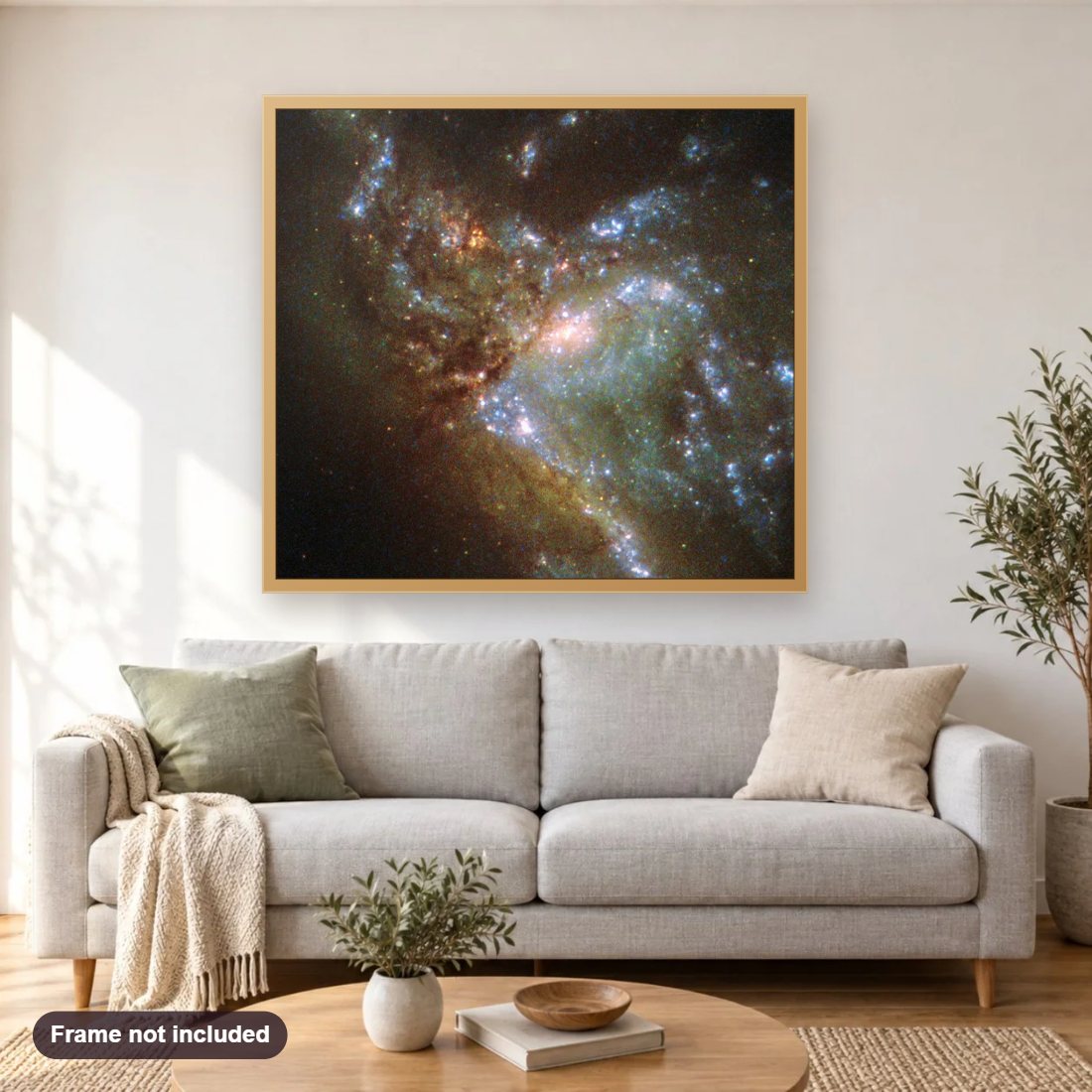 Two Galaxies Merging diamond painting shown framed on a living room wall above a sofa
