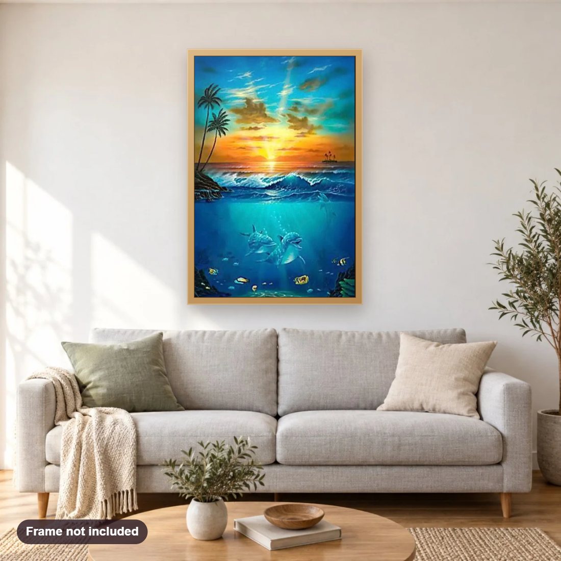 Under Water Dolphins diamond painting shown framed on a living room wall above a sofa