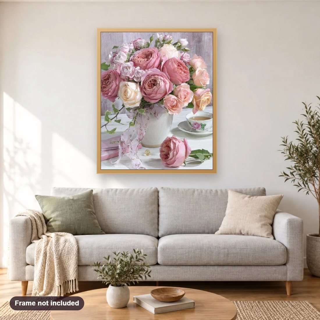 Vase Full of Roses diamond painting shown framed on a living room wall above a sofa