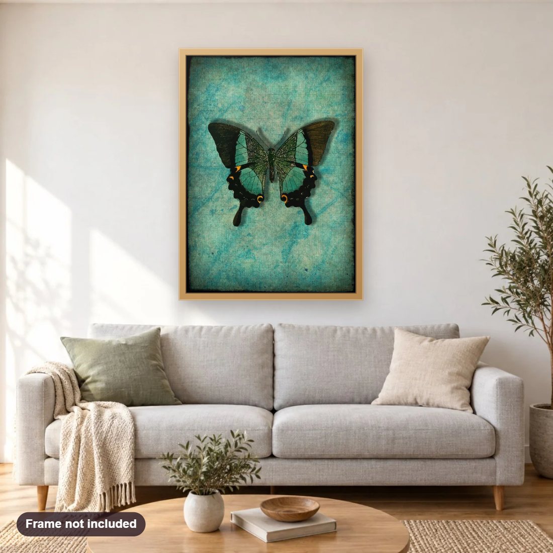 Vintage Butterfly diamond painting shown framed on a living room wall above a sofa