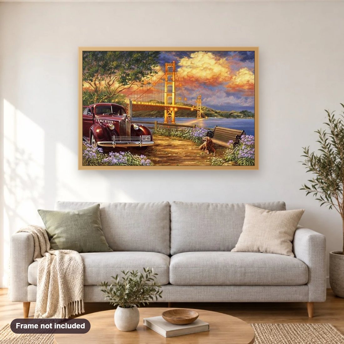 Vintage Car & Suspension Bridge diamond painting shown framed on a living room wall above a sofa