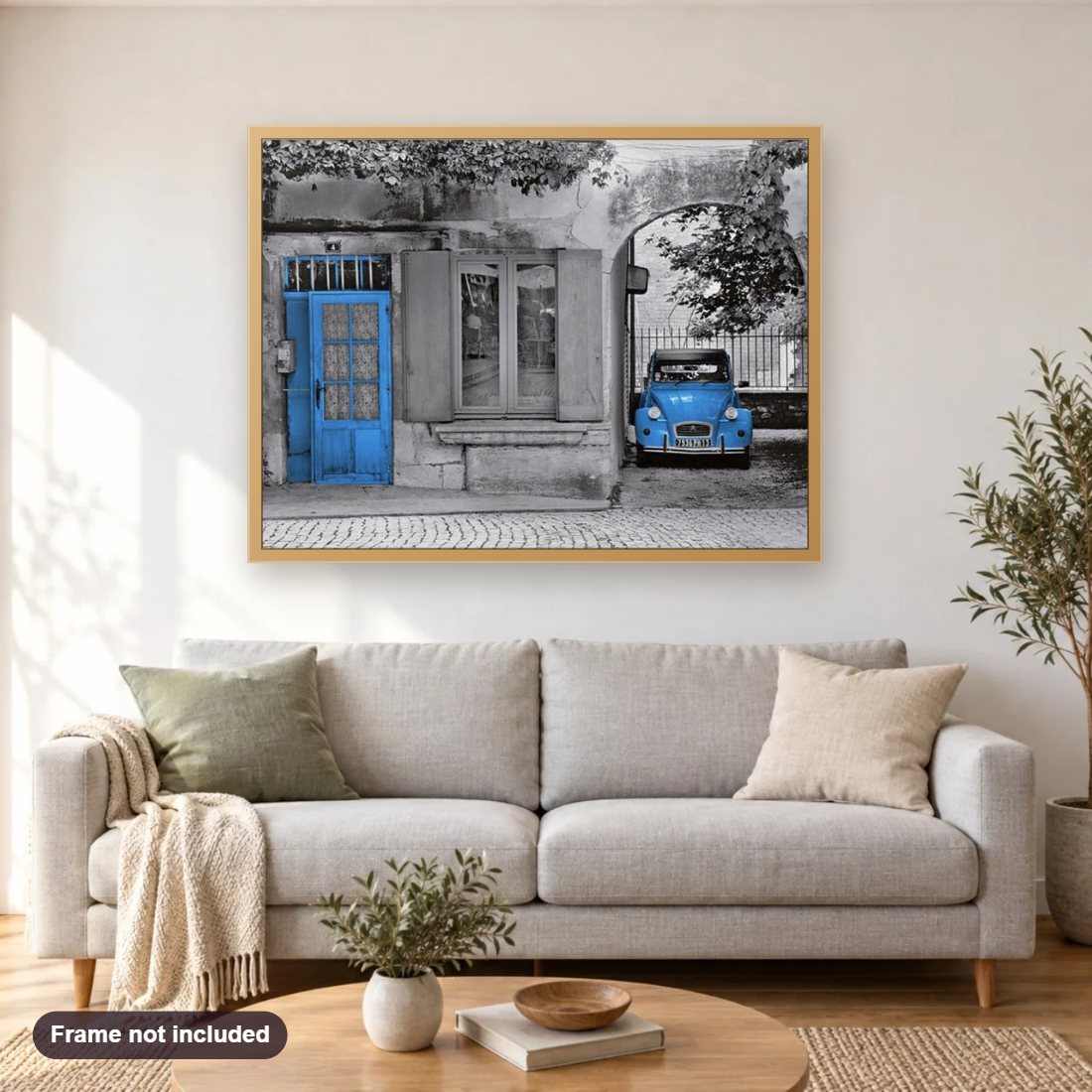 Vintage Citroen 2CV car diamond painting shown framed on a living room wall above a sofa