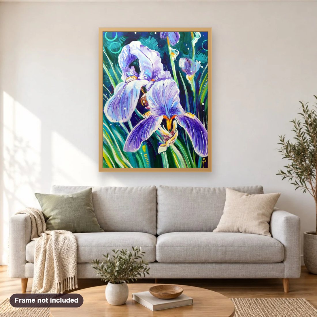 Violet Iris diamond painting shown framed on a living room wall above a sofa