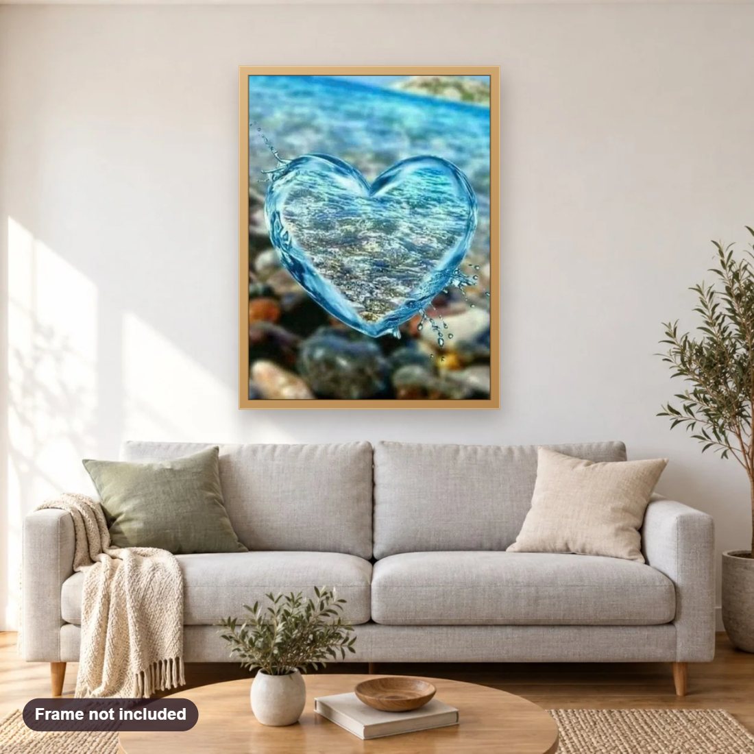 Water Heart diamond painting shown framed on a living room wall above a sofa