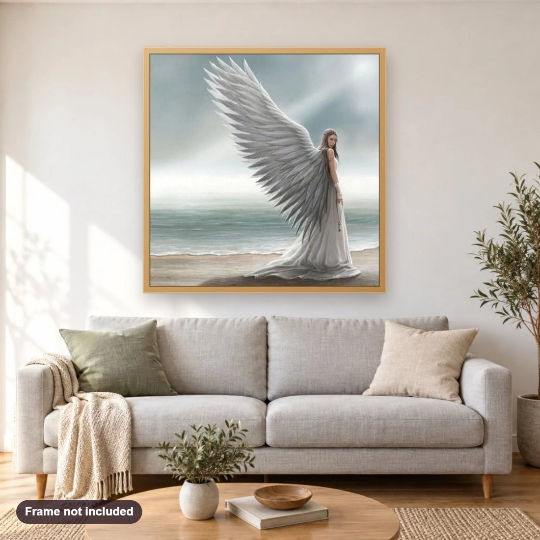 White Angel Girl diamond painting shown framed on a living room wall above a sofa