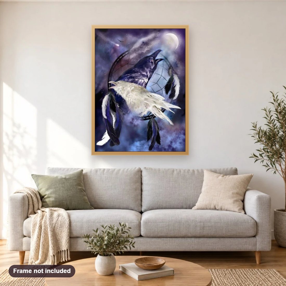 White & Black Raven Dream Catcher diamond painting shown framed on a living room wall above a sofa
