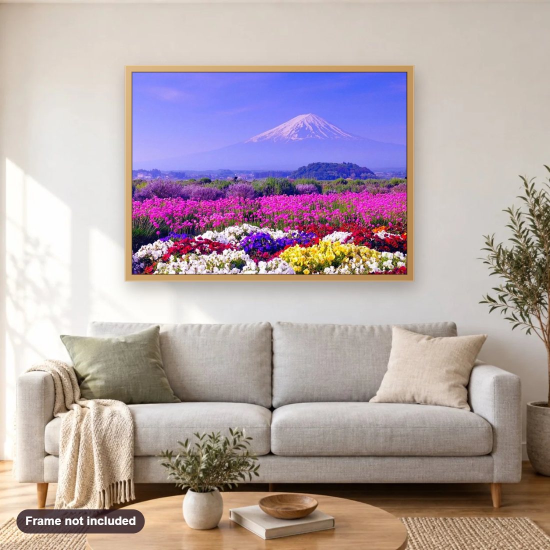 White Mountain & Colorful Flowers diamond painting shown framed on a living room wall above a sofa