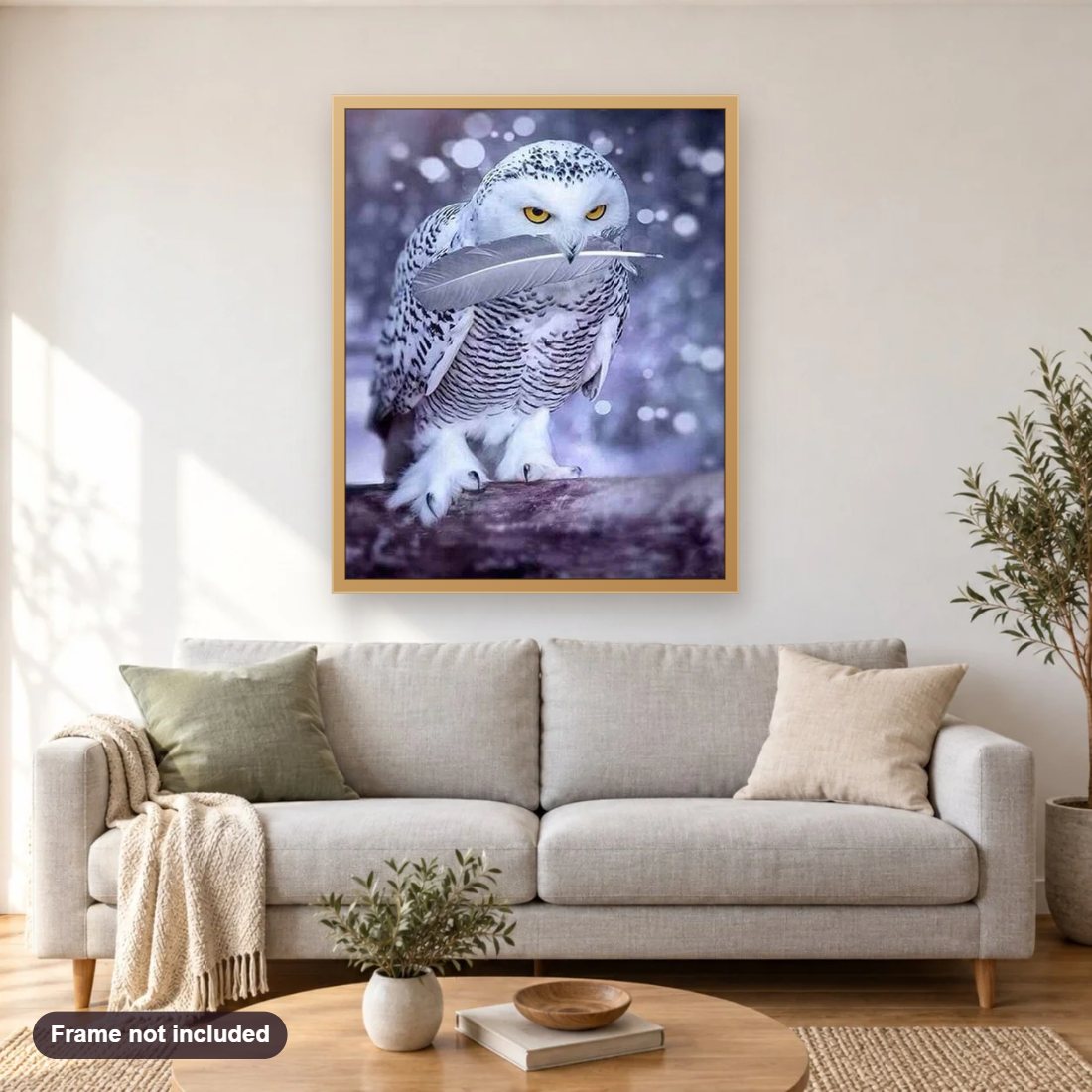 White Owl diamond painting shown framed on a living room wall above a sofa